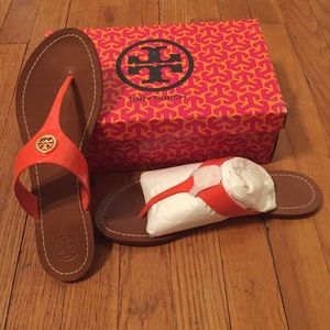 NEVER WORN Orange Tory Burch flip flops.