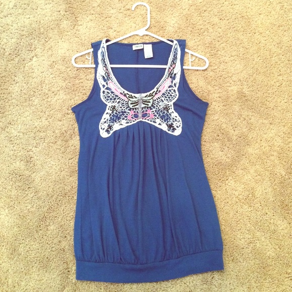 Decorated blue top