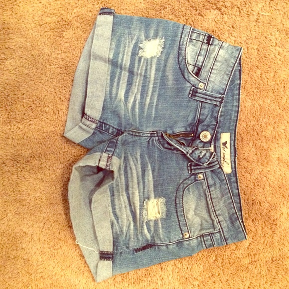 Distressed denim shorts