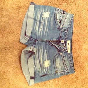 Distressed denim shorts