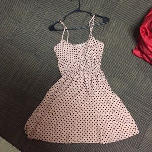 Nude colored dress with black polka dots