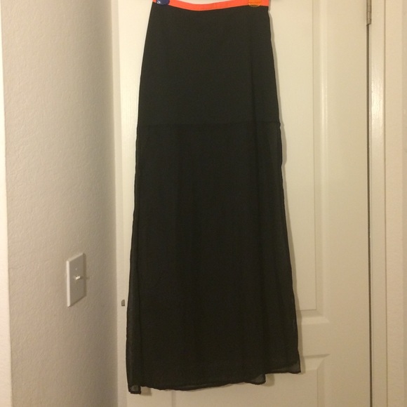 Long black skirt with a pink-orange band
