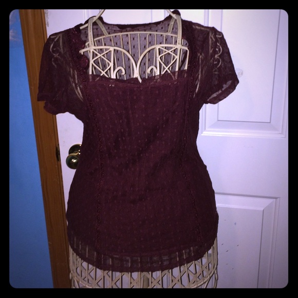 Brick red women's blouse.