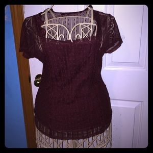 Brick red women's blouse.