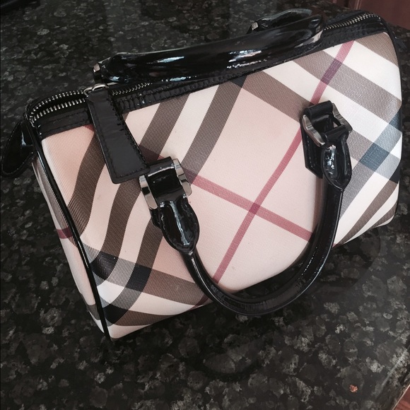 Authentic Burberry small hand bag. No trades