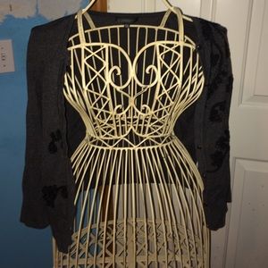 Grey women's cardigan.