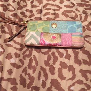 Patterned coach wristlet