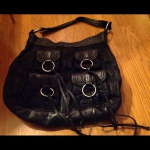 Black cleanable satin and leather trim hand bag