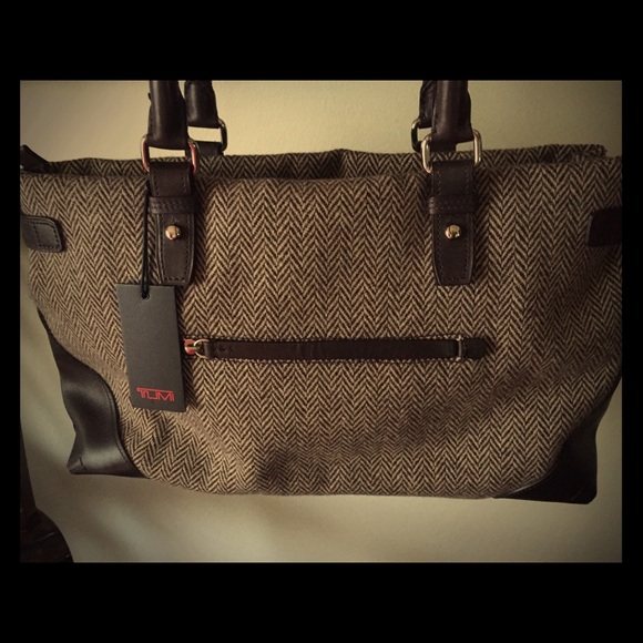 Gorgeous NWT never used Tumi bag!