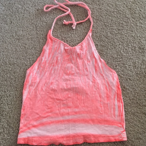 Neon pink halter crop top.
