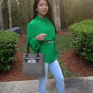 Green neck long sleeved silk blouse