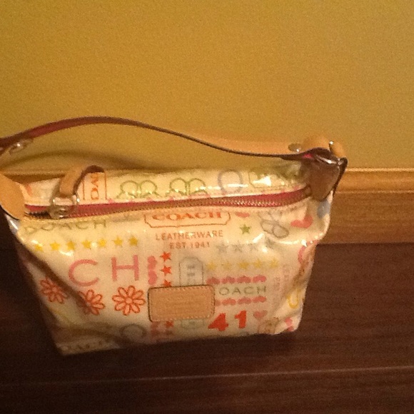 Coach Handbags - Original Glossy Coach with "Coach" all over purse
