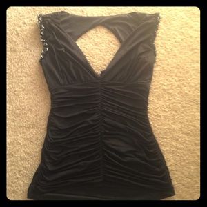 black dressy shirt with chains on sleeves.