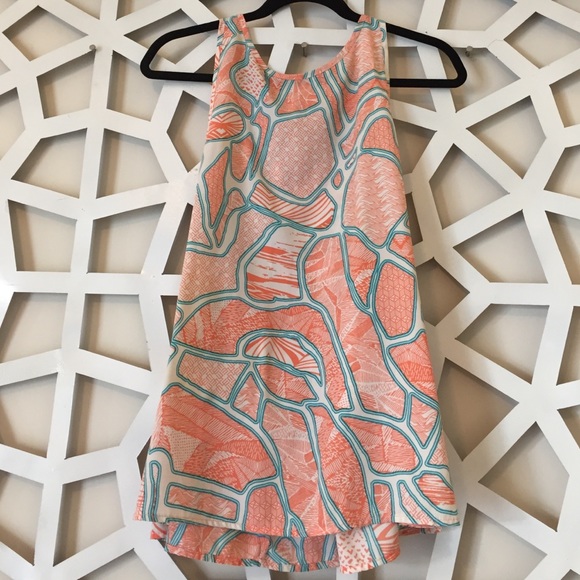 Orange white tank top with blue print