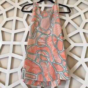 Orange white tank top with blue print