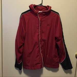 Black/Red Reebok windbreaker.