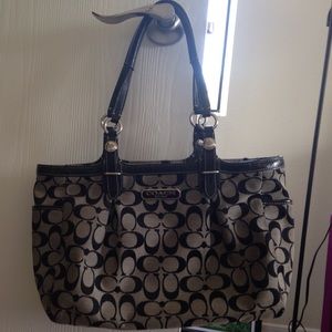 Black and gray coach purse