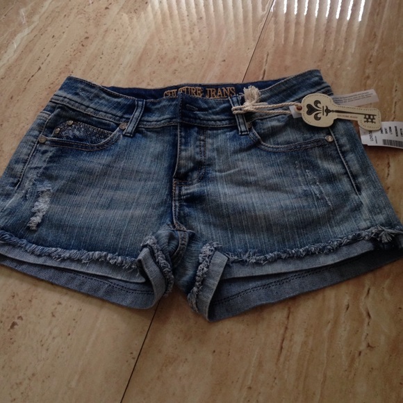 Light blue denim shorts with rinestones never worn
