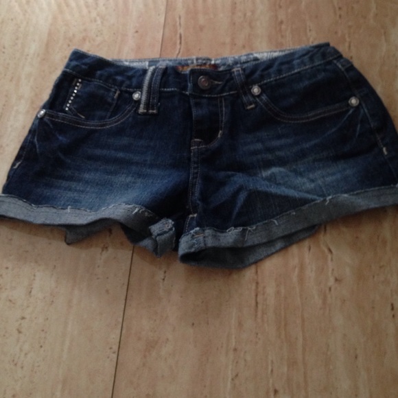Dark blue denim shorts with rinestones pockets