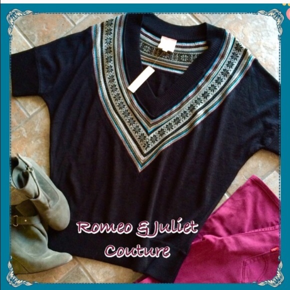 Love this sweater! Black w details