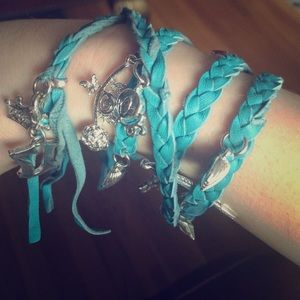 Disney couture leather wrap around charm bracelet.