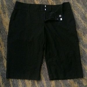 Black board shorts.