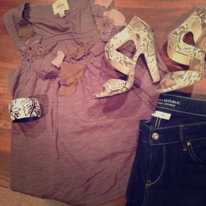 Embellished sleeveless top.Anthropologie