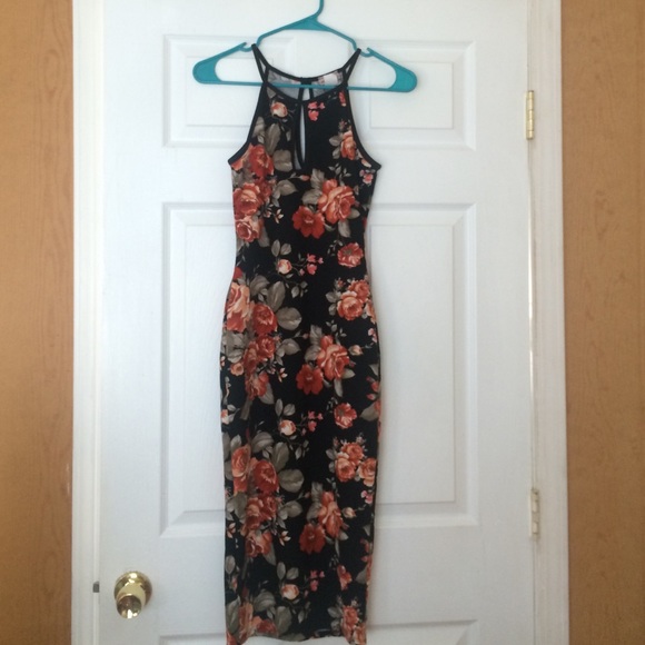 Fitted, long dress (goes past knee)