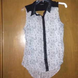 Sleeveless peak-a-boo shirt...  Size Large...