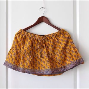 SHORT YELLOW SKIRT WITH PAISLEY PRINT