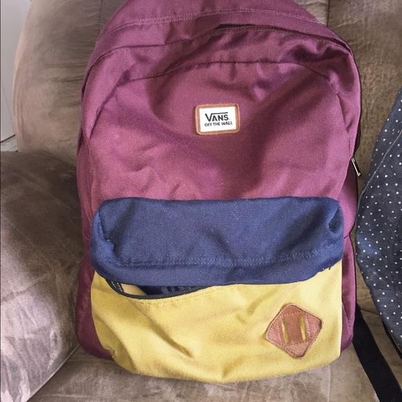 Vans burgundy and mustard backpack.