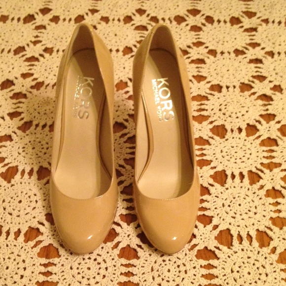 New Micheal Kors heels. Never worn.