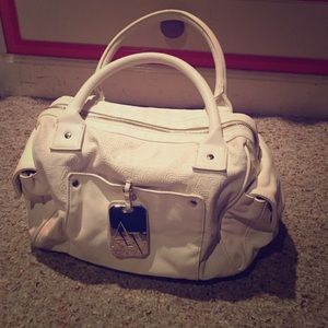 A white Armani Exchange Purse