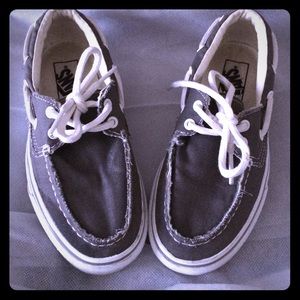 Gray and white boat style vans