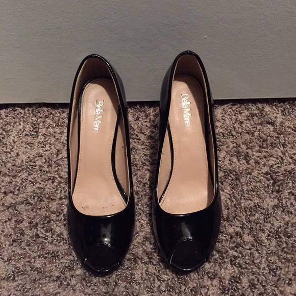 Black patent peep toe pumps