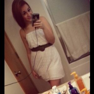 White dress with brown buckle