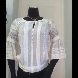 White shirt with bell sleeves