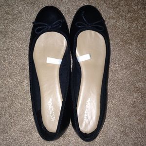 Black leather ballet flats