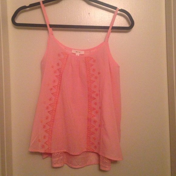 Pink tank with lots of detail on front and back