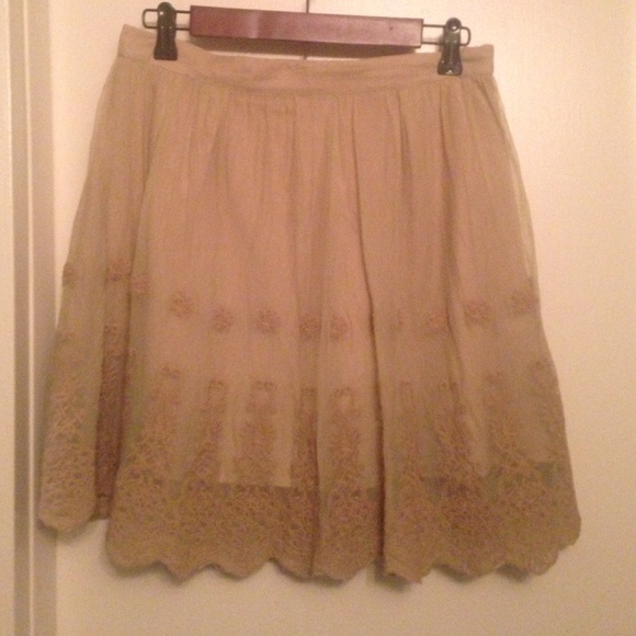 Green skirt with tan detailing
