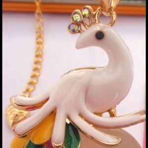 Gina's C beautiful white enamel peacock necklace