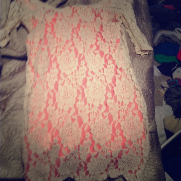 An all lace white and pink dress.