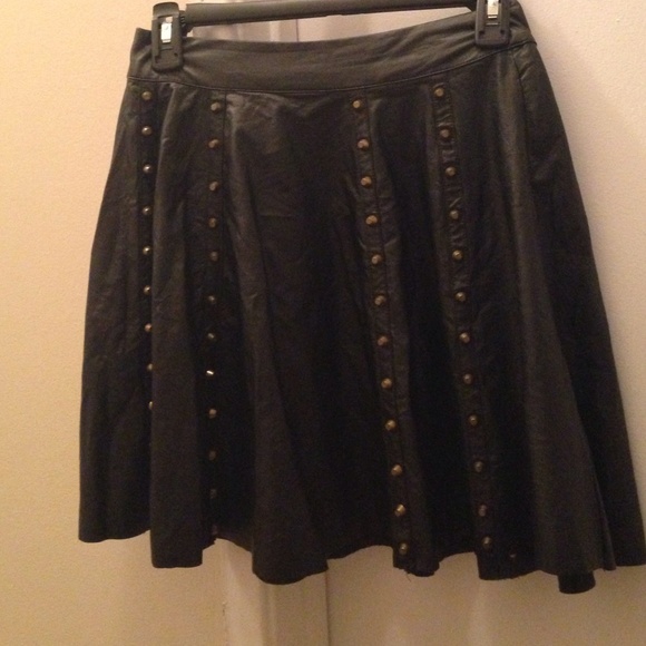 Black leatherette pleated skirt with gold studs