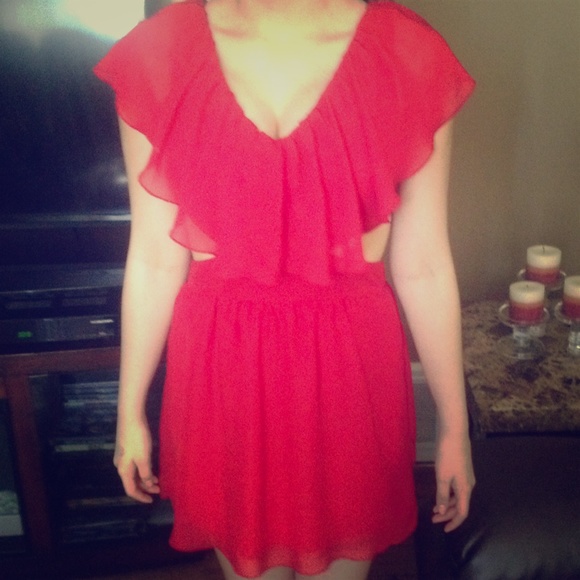 Dresses & Skirts - Red dress with sides cut out