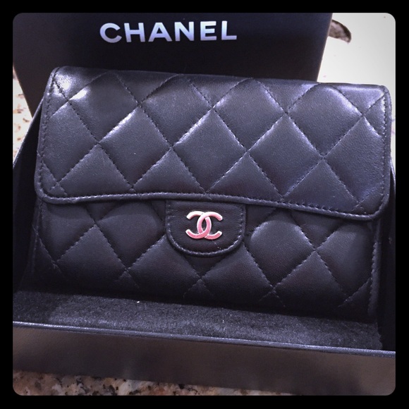 SOLD- Chanel small flap wallet in black lambskin