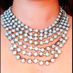 Collar necklace.