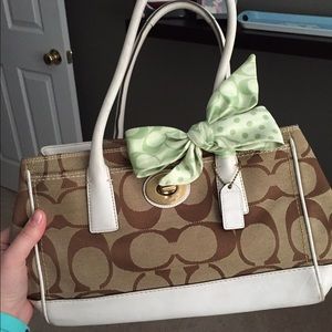 Coach purse with green bow