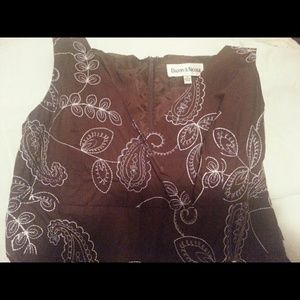 Danny and Nicole brown with white design dress