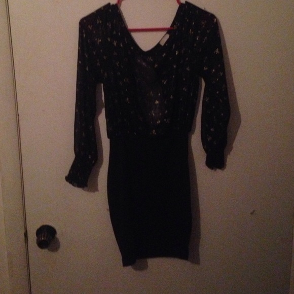 Black and gold dress with an open back