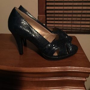 Leather open toed high heel shoes